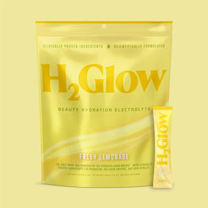 H2Glow hydration variety pack drink mix by H2Glow in bright yellow with Fresh Lemonade stick.
