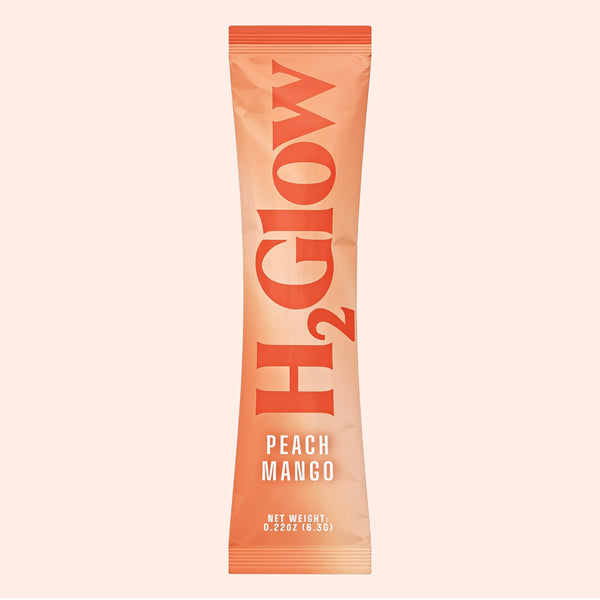 Peach Mango stick pack with orange graphics and text, showing net weight